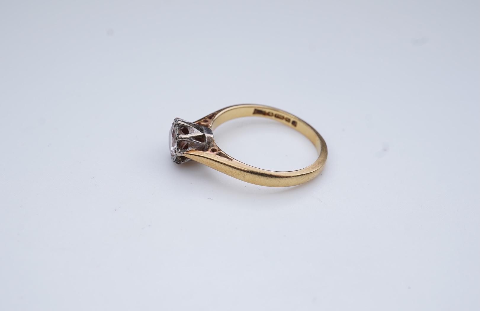A diamond solitaire ring